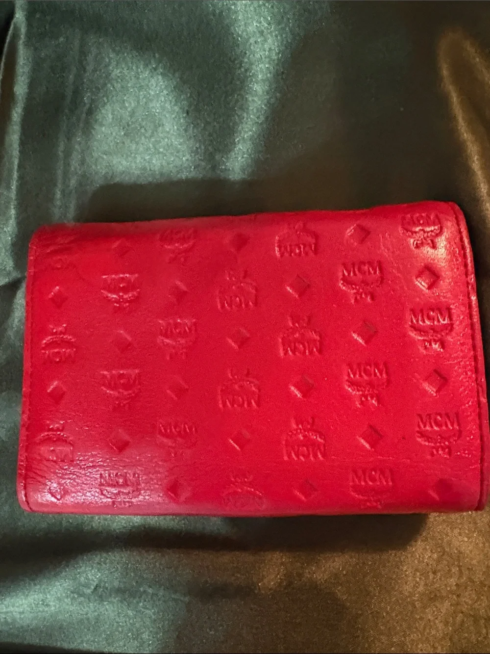 MCM Red Embossed Leather Trifold Wallet with Gold Plaque Accent